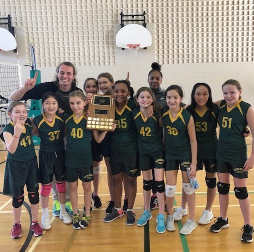 Adam Thompson coaching indoor volleyball